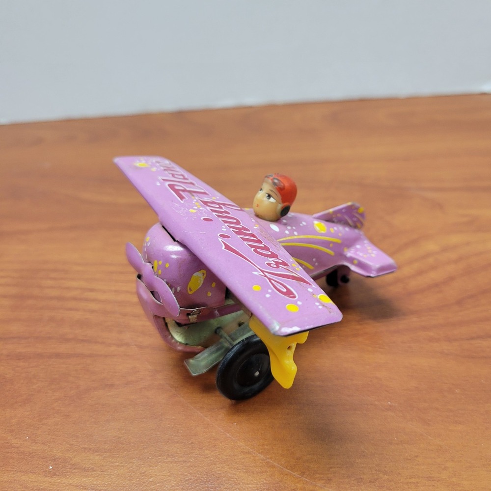 Vintage Tin Litho Purple Training Plane wind-up toy